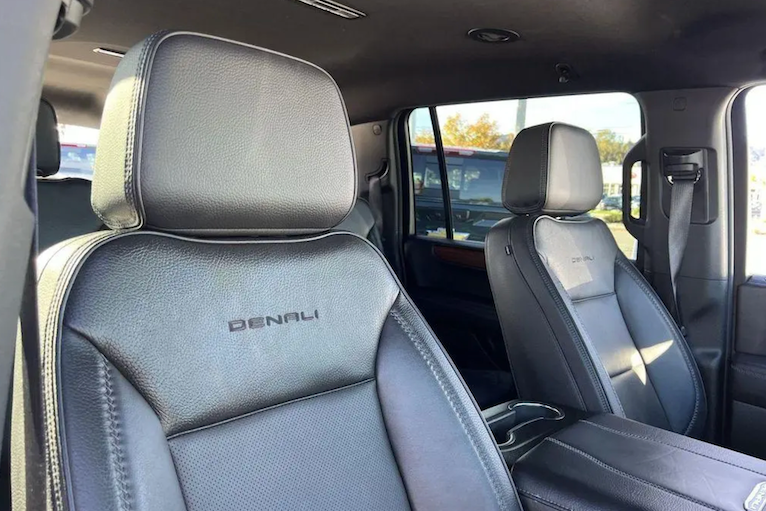 Gray leather Denali car seats inside a vehicle with visible branding.