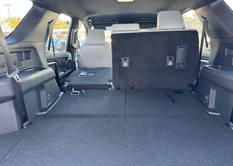 Back interior of a vehicle with folded seats