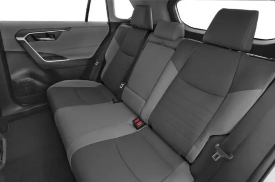 Gray car seats with a visible seat belt in a vehicle interior.