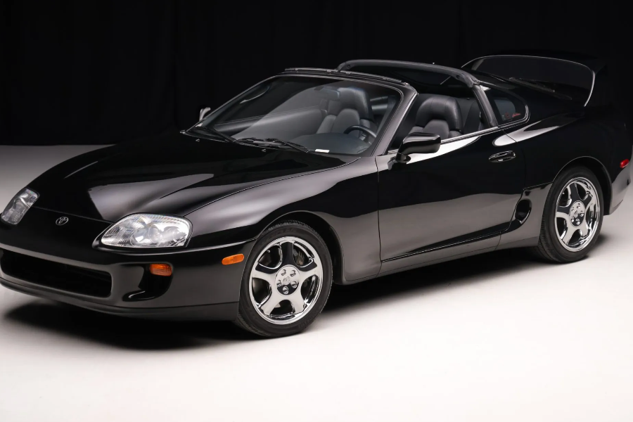 Black sports car on a white background