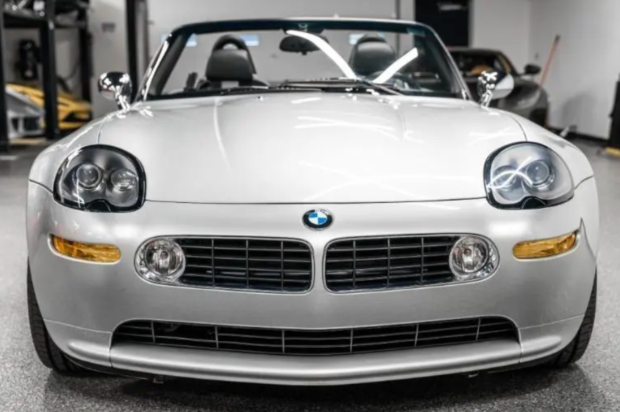 Silver BMW Z8 roadster in a showroom setting