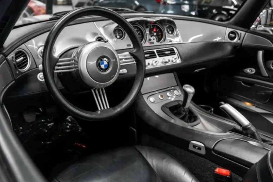 Car interior with BMW steering wheel and dashboard