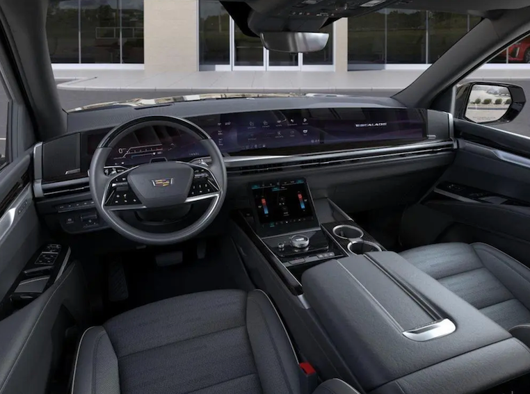 Luxury car interior with steering wheel and dashboard