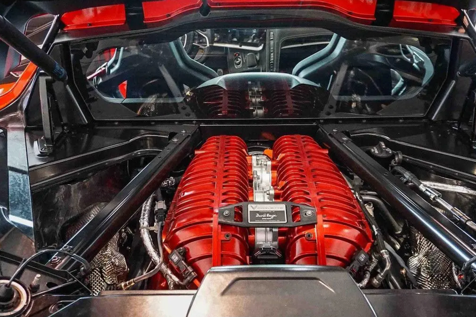 Red engine of a car with visible branding