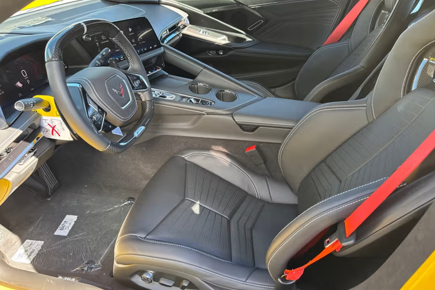 Car interior with steering wheel and dashboard
