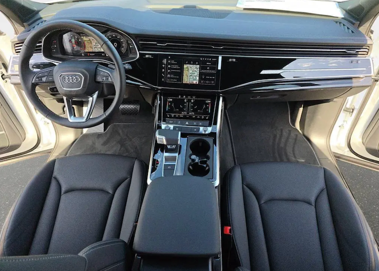 Car interior with steering wheel and dashboard of an Audi vehicle