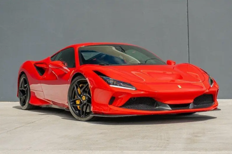 Red sports car on a gray background