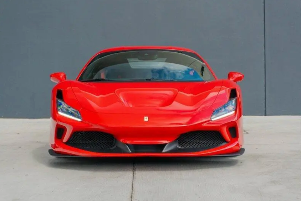 Red sports car on a gray background