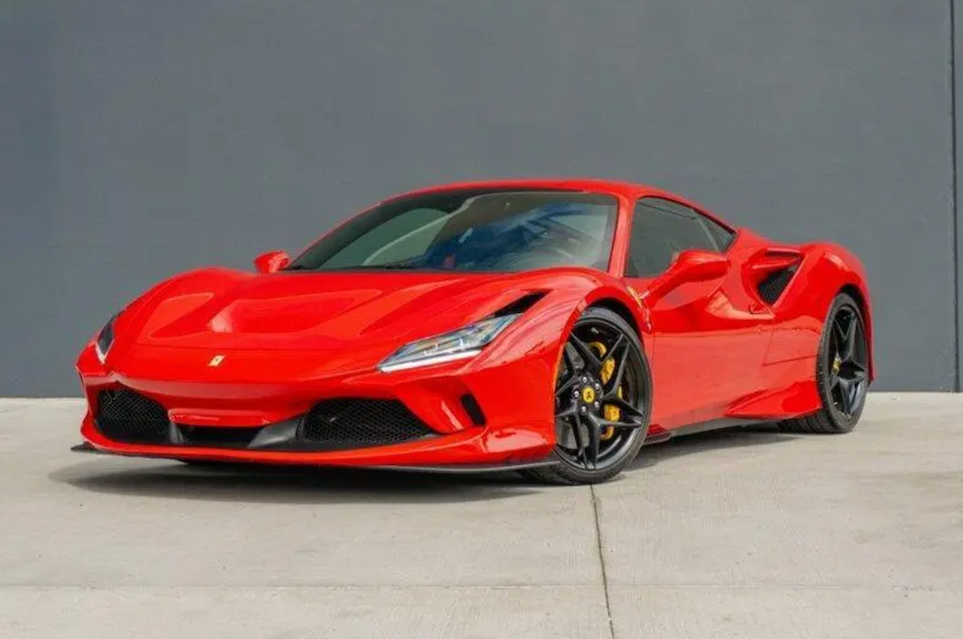 Red sports car on a gray background