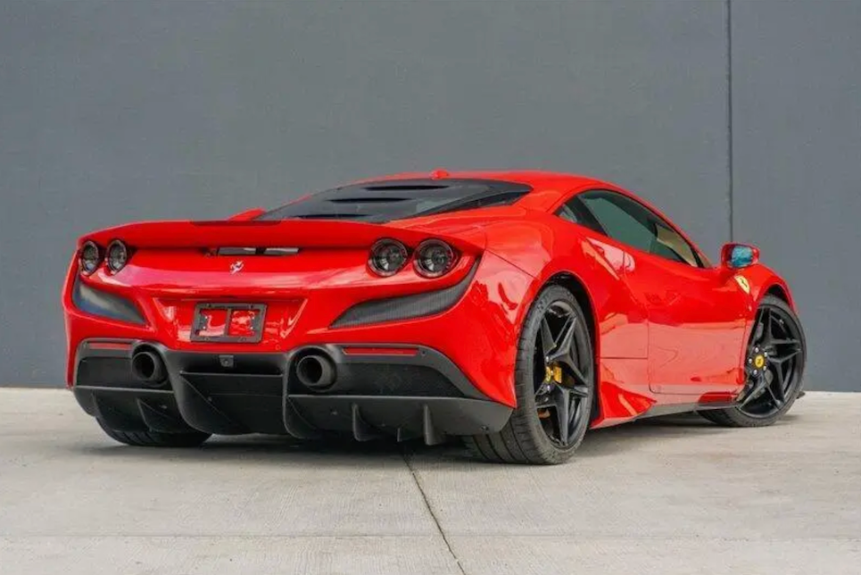 Red sports car on a gray background