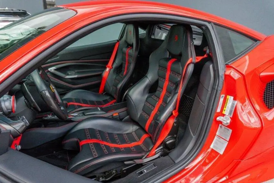 Red sports car interior with black and red seats