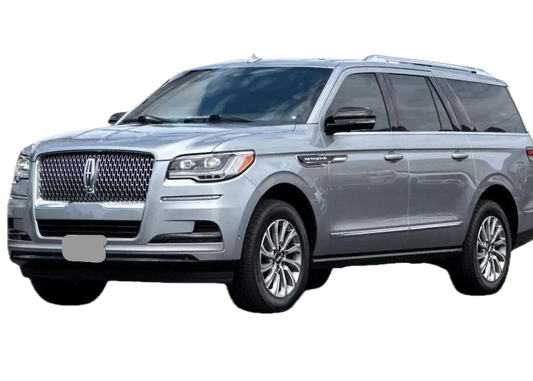 Silver SUV with a visible license plate on a white background