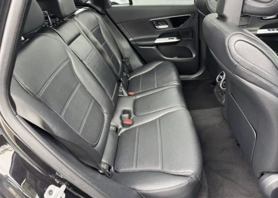 Gray car interior with a focus on the back seat.