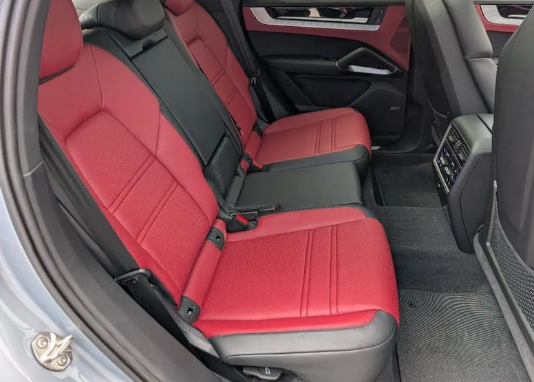 Red car seats inside a vehicle with gray interior