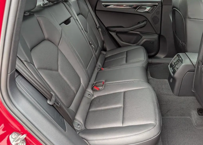 Gray car interior with folded back seat