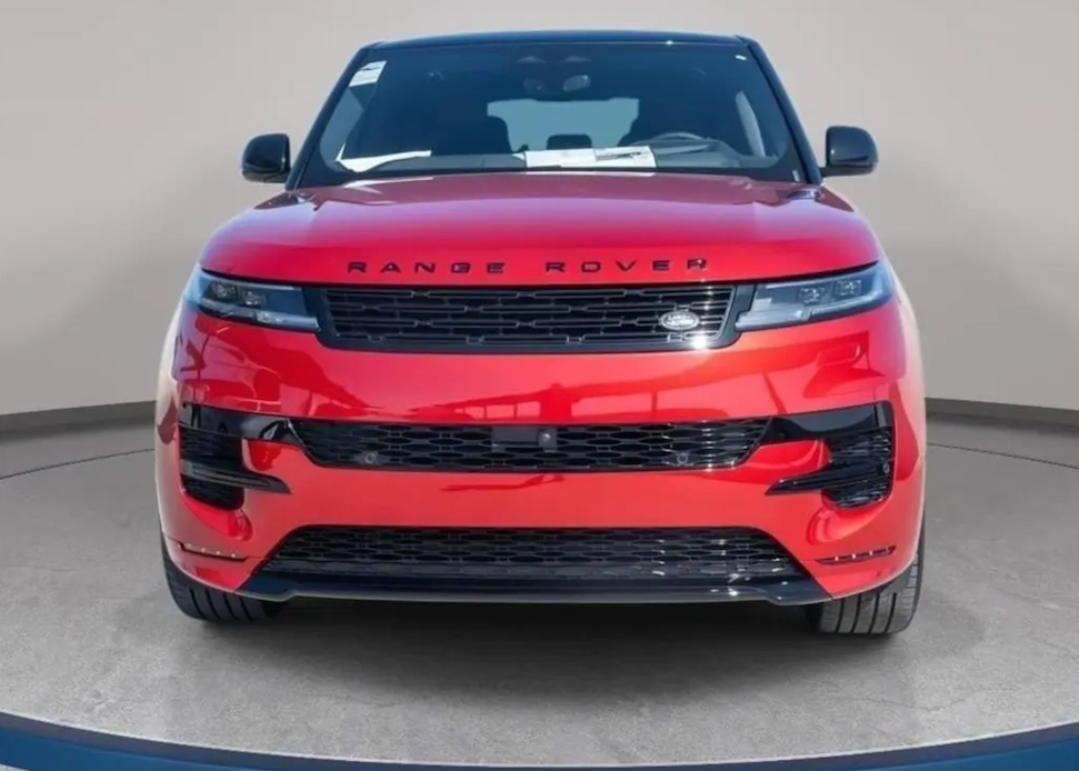 Red Range Rover on a showroom floor