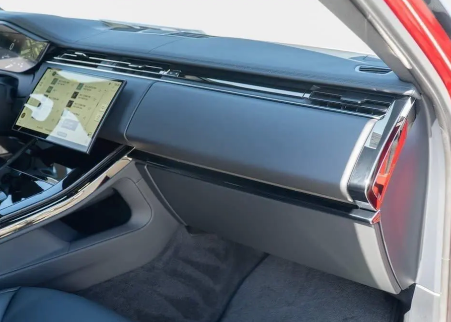 Car interior with a focus on the dashboard and center console.