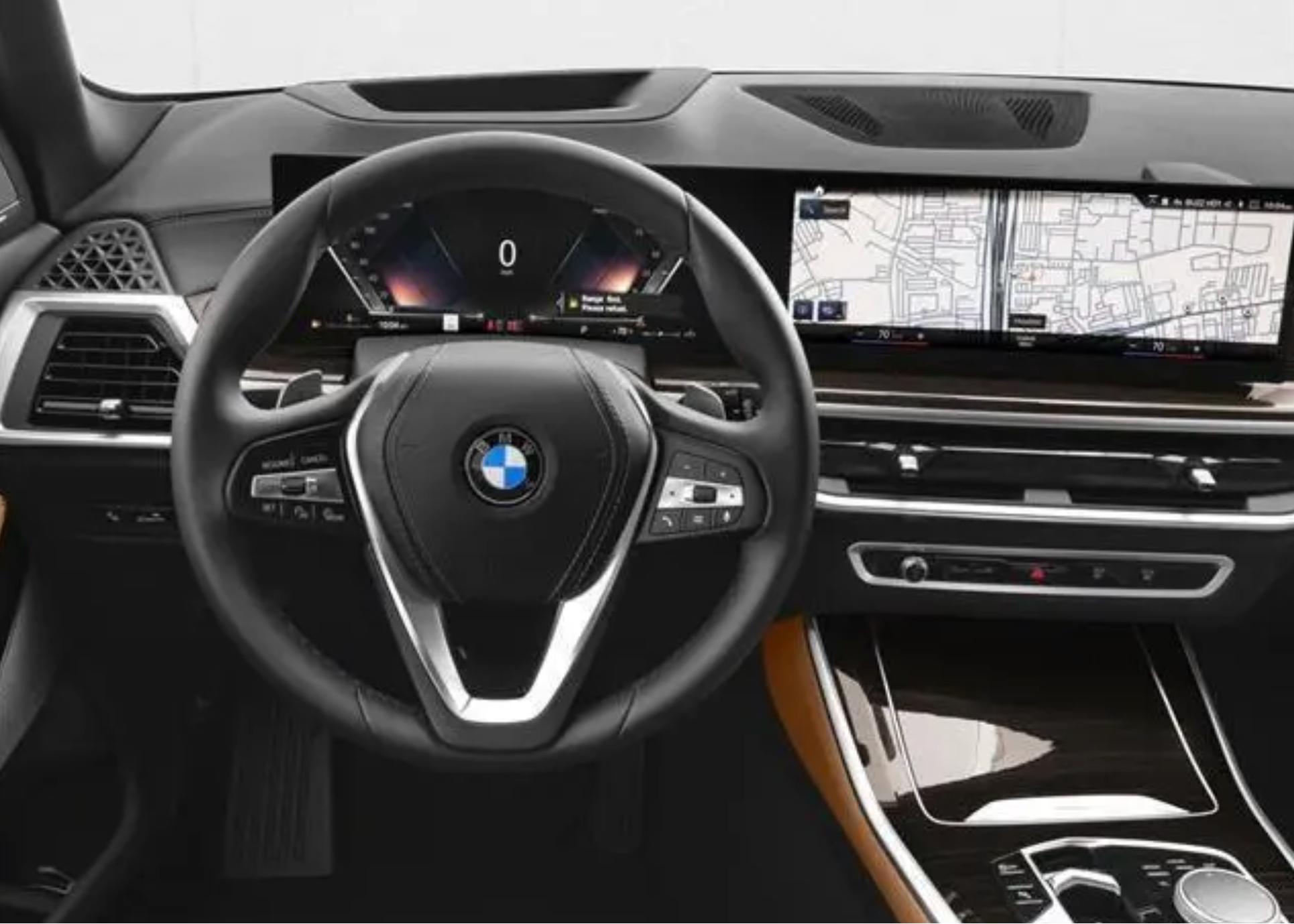 Car interior with steering wheel and dashboard display on a white background
