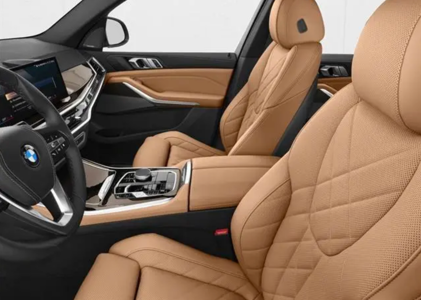 Beige leather interior of a BMW car with dashboard and steering wheel visible.