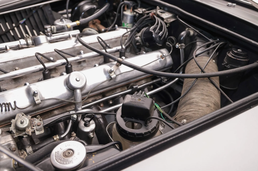 Close-up of a car engine with visible brand name