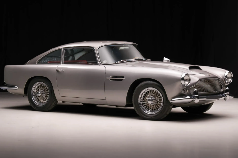 Silver vintage car on a black background