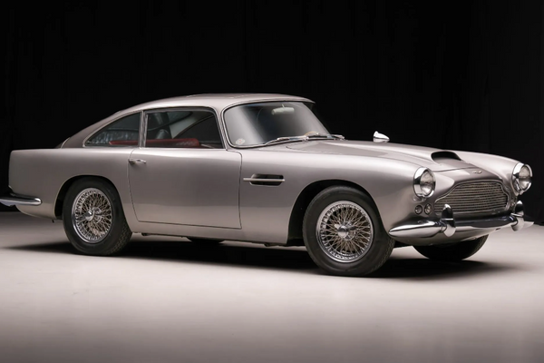 Silver vintage car on a black background