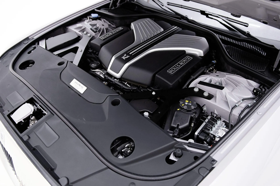 Car engine compartment with visible branding