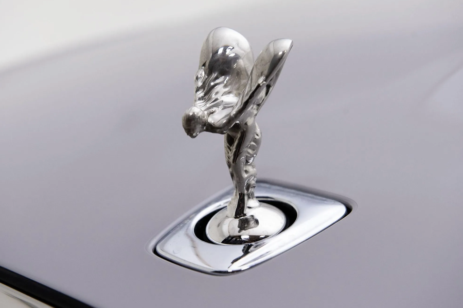 Rolls-Royce hood ornament on a car