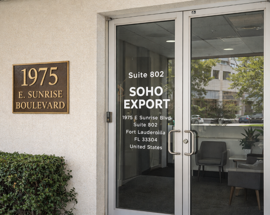 Office entrance with glass doors and a sign reading 'Soho Export' on 1975 E. Sunrise Boulevard, Suite 802.